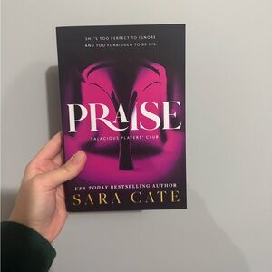 Signed copy of Praise by Sara Cate